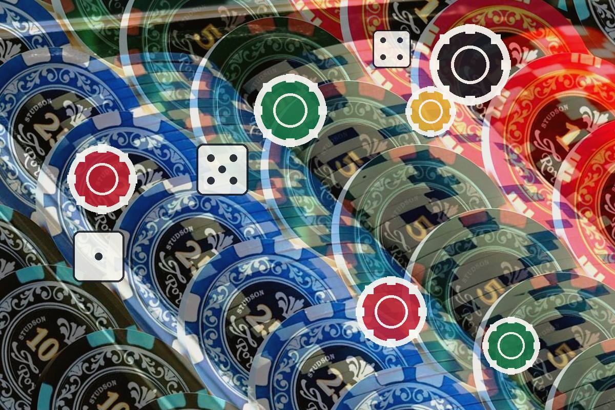 Colorful casino chips with white-edged circular control icons (red, green, yellow) and small dice motifs, indicating interactive game controls.